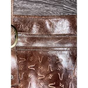 Velez brown leather shoulder bag with an embossed logo pattern satchel VTG